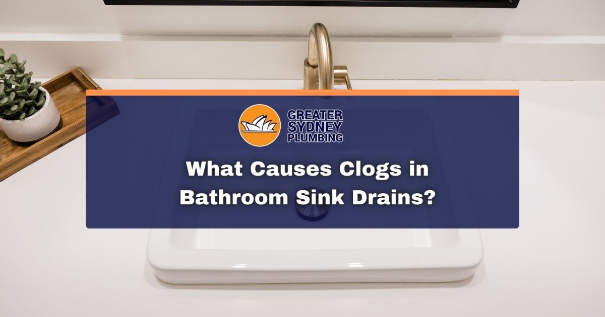 What causes clogs in bathroom sink drains